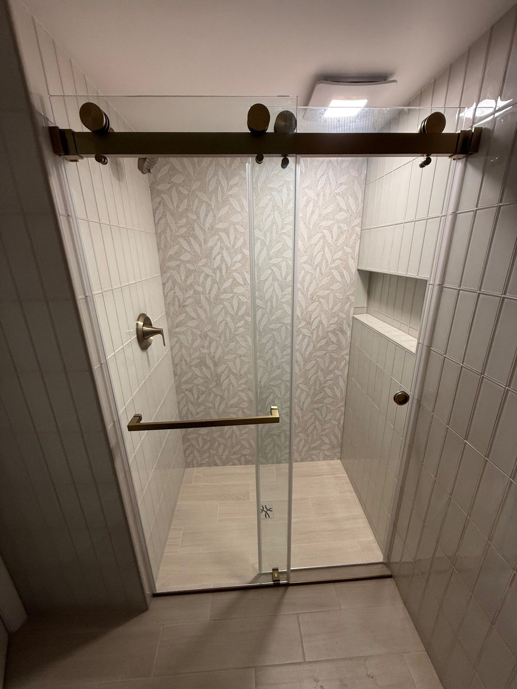 Built-in shower niche with stacked wall tile