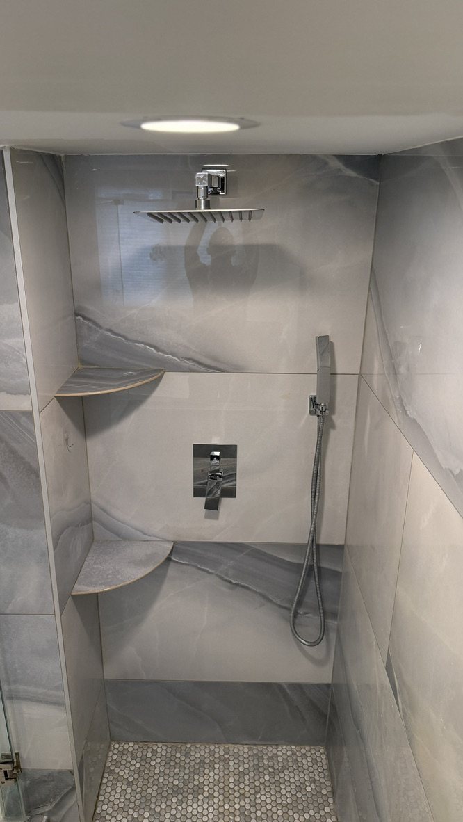 Original shower head and chrome fixtures